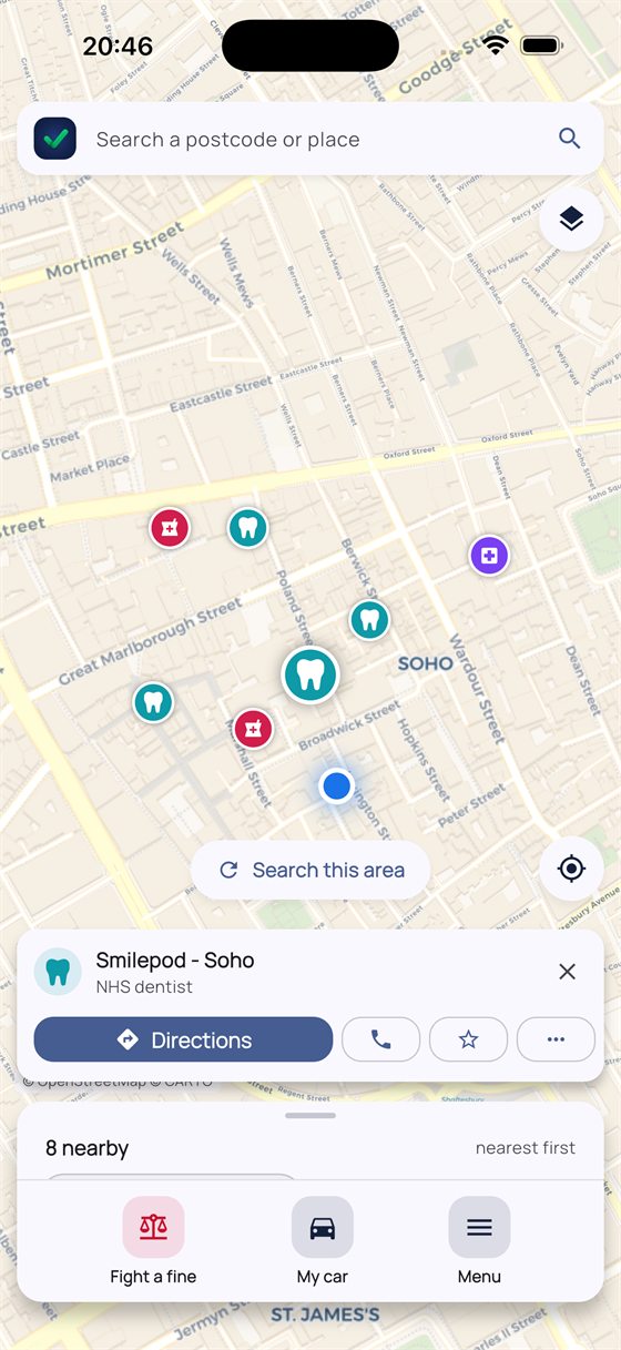 A selected NHS dentist card above the map with buttons for directions, phone call and saving the place.